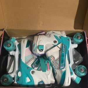Teal and White Roller Skates